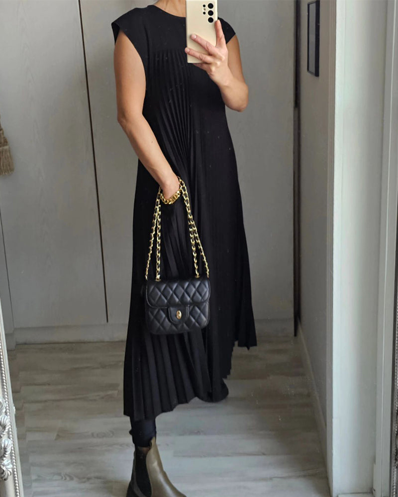 Ärmlös plisserad chic till perfektion