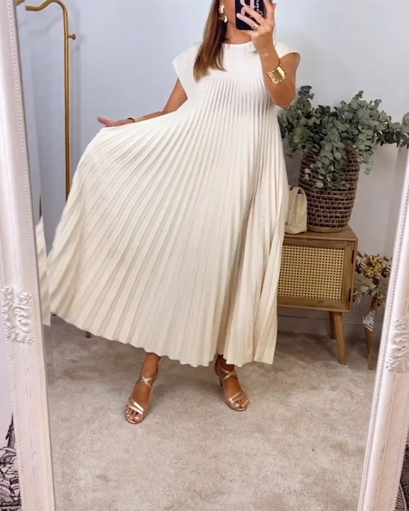 Ärmlös plisserad chic till perfektion