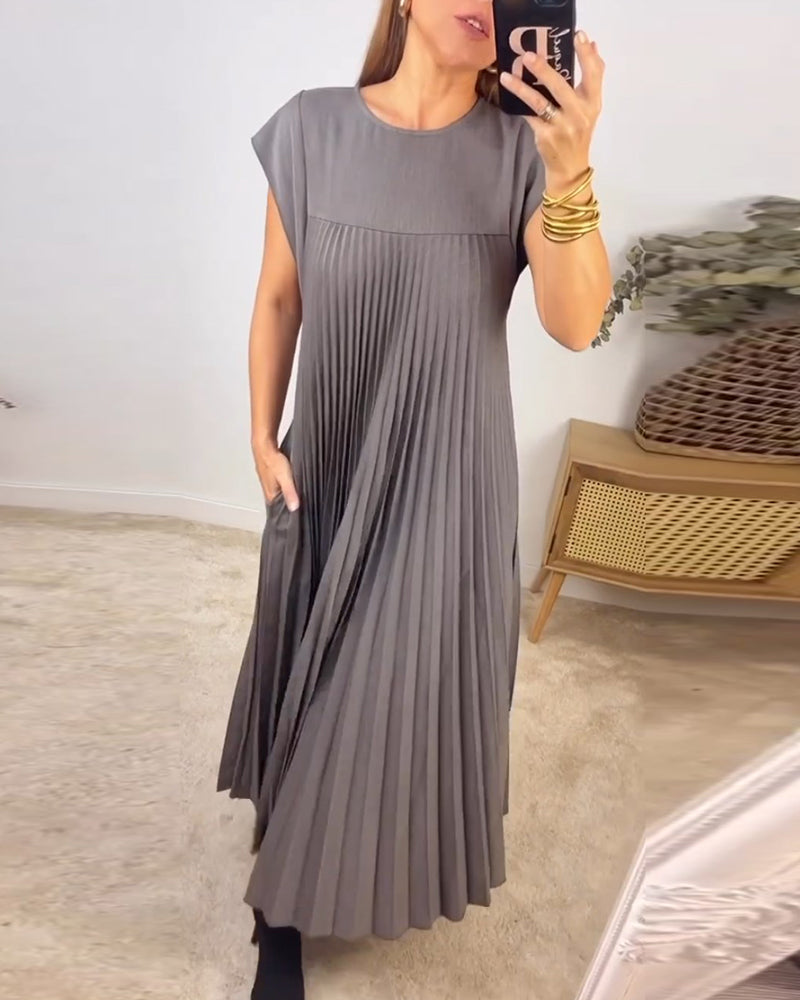 Ärmlös plisserad chic till perfektion