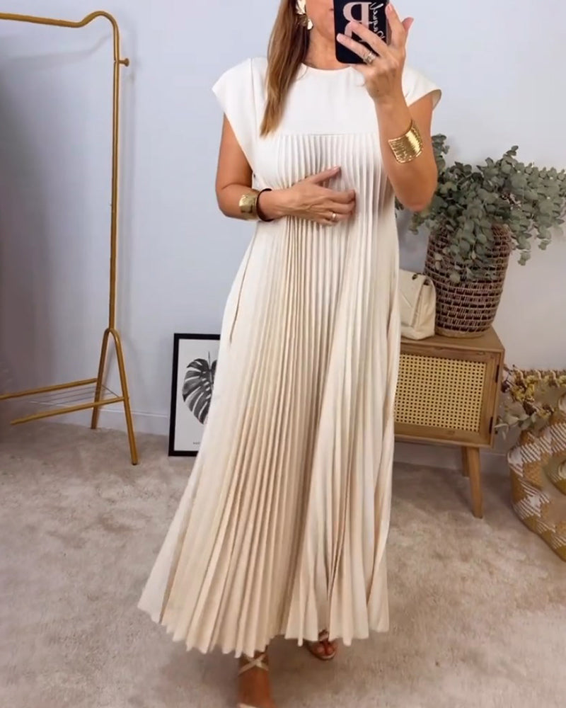 Ärmlös plisserad chic till perfektion