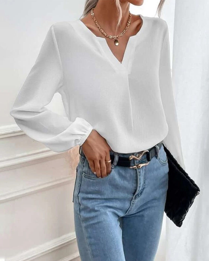 Blus med enfärgad med långärmad